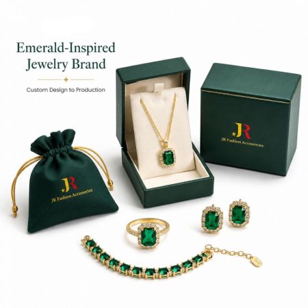 Emerald-inspired gold jewelry set featuring necklace, ring, earrings, and bracelet with luxury custom boxes.