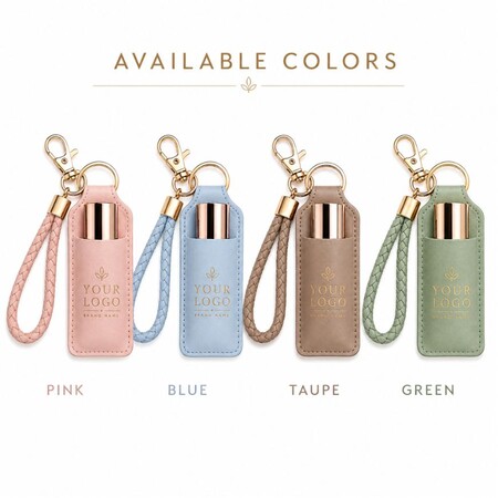 Customizable PU leather lip balm keychains with braided wristlets available in pink, blue, taupe, and green options.