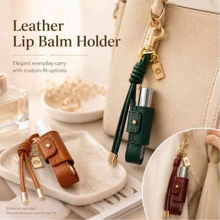 Custom leather lip balm holder keychain attached to beige handbag, ideal for promotional cosmetic accessories.