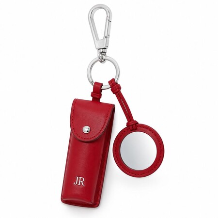 Red leather lipstick pouch keychain featuring a round mirror charm, ideal for cosmetic brand gifts.