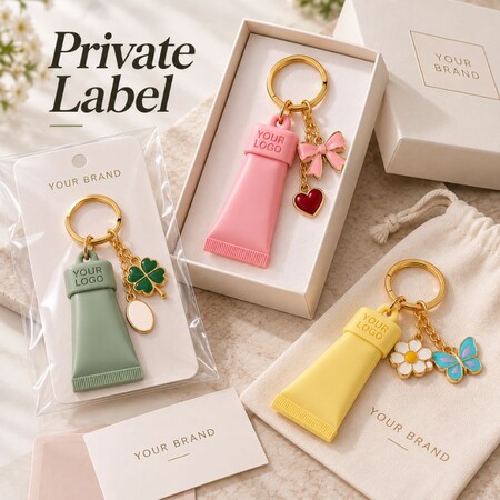 Private label silicone keychains with custom backing cards, gift boxes, and branded drawstring pouches.