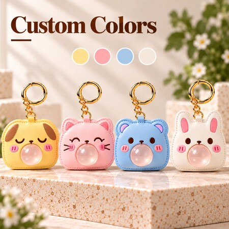 Custom color options for animal bubble keychains with gold clasps, perfect for wholesale retail merchandising.