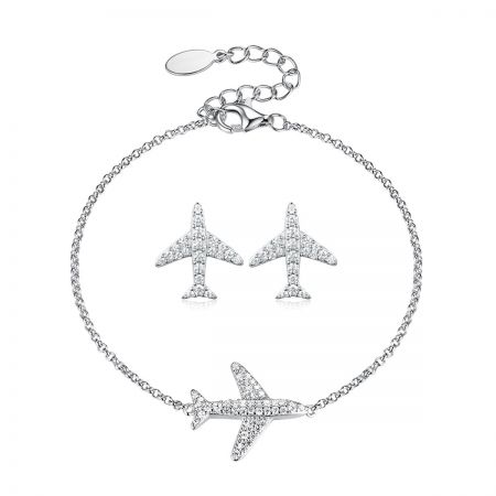 Conjunto de pulsera y pendientes de avión de plata 925 con circonitas cúbicas. - Un conjunto completo de joyería temática de avión minimalista en plata esterlina 925, que incluye una pulsera delicada y pendientes a juego incrustados con circonita cúbica brillante.