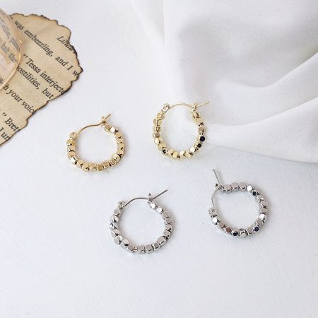 Crushed Stone Small Square Beads Hoop Earrings - A product shot of Crushed Stone Small Square Beads Hoop Earrings, showcasing four pairs in both gold and silver finishes.