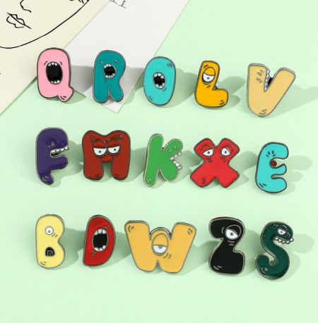 Wholesale Colorful Letter A-Z Brooch Metal Lapel Pin - A vibrant collection of wholesale colorful letter A-Z brooch metal lapel pins, each featuring a unique cartoon expression. Customizable enamel pins by JR Fashion Accessories.