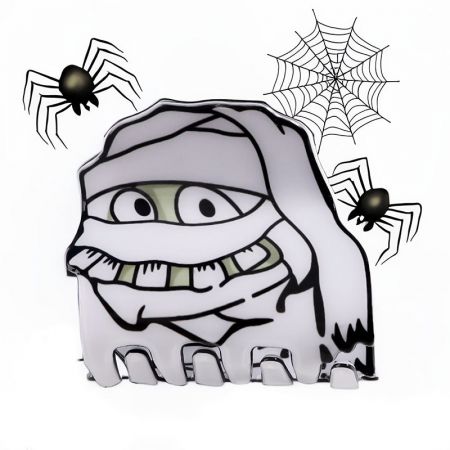 A cute cartoon mummy design on a Halloween hair claw clip.
