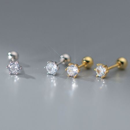 925 Zilveren Cubic Zirconia Zes-Punts Klauw Schroef Stud Oorbellen - Een collectie van 925 sterling zilveren zes-punts stud oorbellen met briljante cubic zirconia, weergegeven in zowel zilveren als gouden afwerkingen.