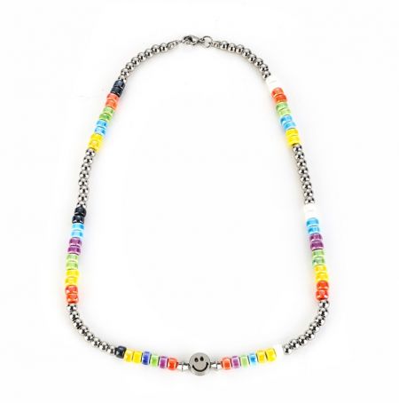 Detailed view of the stainless steel necklace featuring rainbow beads and a central smiley face charm, showcasing the quality craftsmanship.