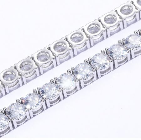 Comparison of two different moissanite bracelet settings, highlighting the intricate design details.