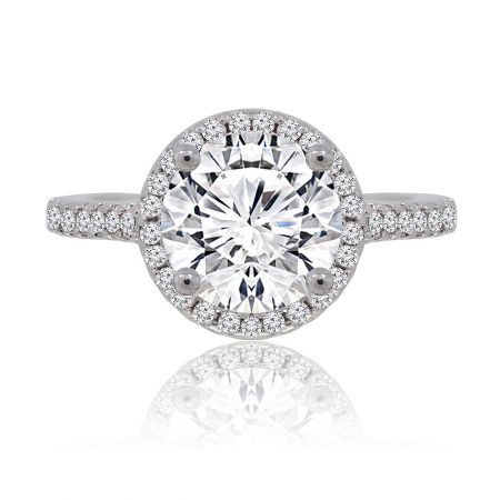 Unique Forever Engaged Ring - A close-up of the Unique Forever Engaged Ring, showcasing a brilliant 8mm round cubic zirconia center stone surrounded by a sparkling halo, set on a rhodium-plated brass band.
