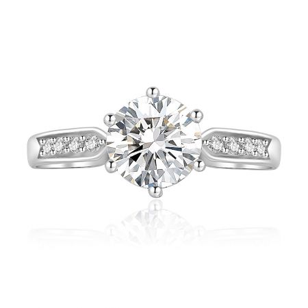 6 Claws Solitaire Ring - A close-up of the 6 Claws Solitaire Ring, showcasing its prominent central cubic zirconia stone and sparkling accent stones on the rhodium-plated band.