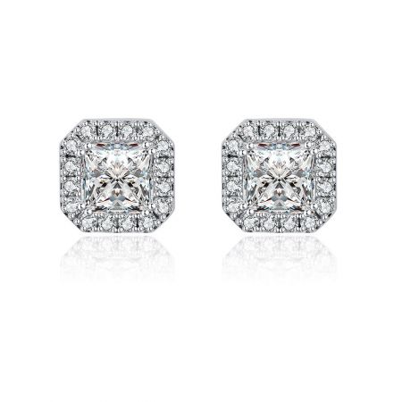 Mini Zirconia Cushion Stud Earrings - A pair of Mini Zirconia Cushion Stud Earrings featuring square-cut center stones with a halo design, crafted in rhodium-plated brass.