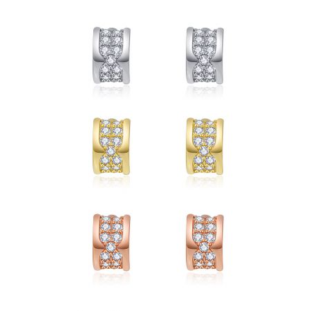 Mini Curved Pave Earring Set - Mini Curved Pave Earring Set displaying three pairs of stud earrings in silver, gold, and rose gold finishes, each adorned with cubic zirconia.