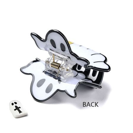 Close-up view of a single white ghost-shaped hair clip, showing the durable PVC material and spring mechanism.