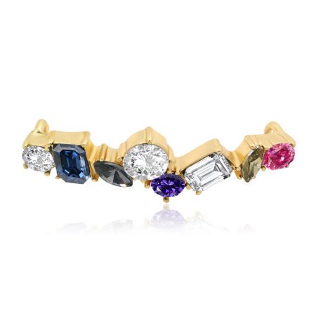 Close-up of the gold-plated shoe charm with a variety of colorful glass and crystal fittings.