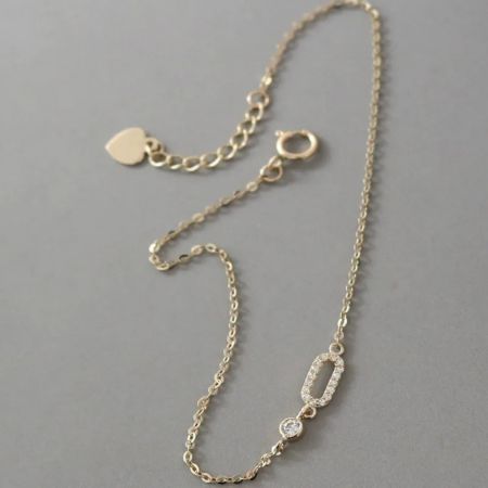 Elegant 925 sterling silver and CZ bracelet with baguette-cut stones, perfect for stacking.