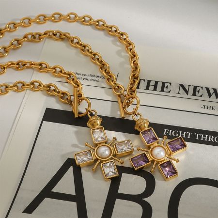 A close-up of the amethyst purple crystal and pearl cross choker necklace, highlighting its Y2K style.