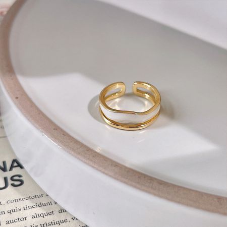 Detailed view of the 14k gold-plated double-loop adjustable ring.