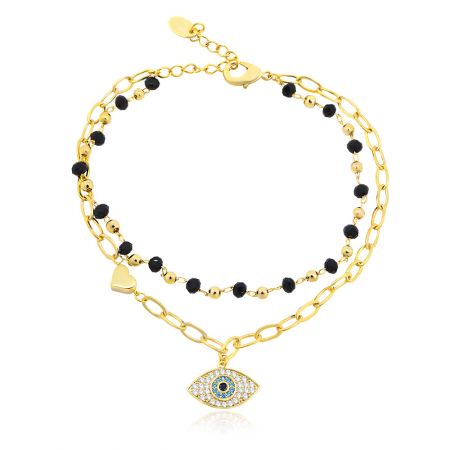 Seed Beads Evil Eye Bracelet - Close-up of the Seed Beads Evil Eye Bracelet, showing the detailed 18k gold chain, central eye charm with cubic zirconia, and black bead accents.