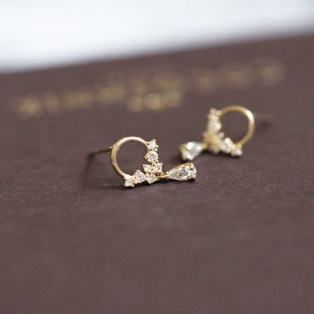 Front view of the 925 silver gold zircon teardrop hoop earrings, showcasing the brilliant gemstones.