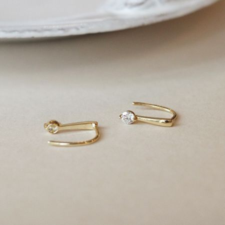 Clean product shot of the 925 silver gold zircon earrings on a white background.