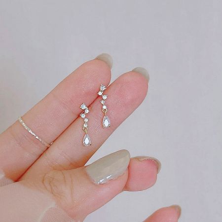 Full pair view of the gold-plated sterling silver teardrop earrings against a white background.