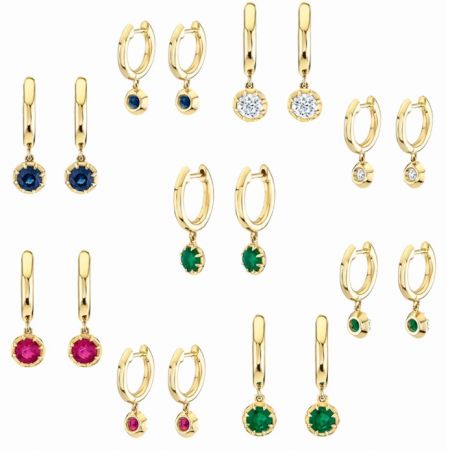 Pendientes colgantes Huggie de Halo - Una colección de pendientes Halo Huggie Drop, con baño de oro y circonio cúbico brillante en varios colores, exhibidos sobre un fondo neutro.