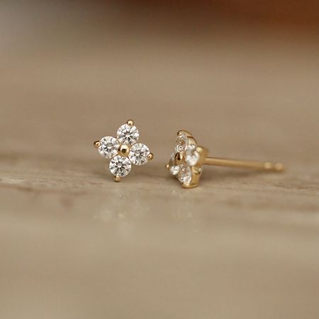 Another angle of the lucky four-leaf clover stud earrings, highlighting their delicate craftsmanship.