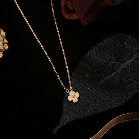 Full product view of the 925 sterling silver clover opal necklace.