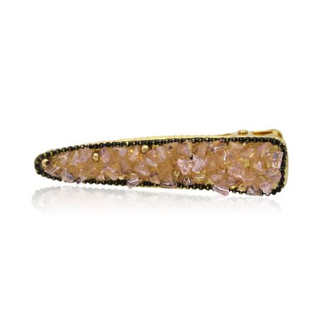 Prendedor de Cabelo de Cristal Fashion mostrado em uma variação de gema rosa.