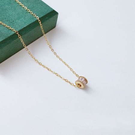 Gold Plated Zircon Wheel Cylindrical Catheter Choker Necklaces - A stunning gold-plated choker necklace with a sparkling zircon crystal pendant, part of a set of five. Crafted from brass by JR Fashion Accessories.