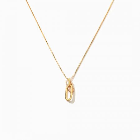 Another angle of the gold interlocking pendant necklace, highlighting its elegant design.