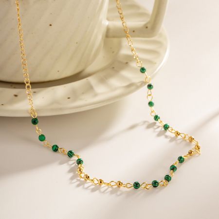 Detailed shot of the necklace's clasp and extender chain, highlighting its adjustable feature.