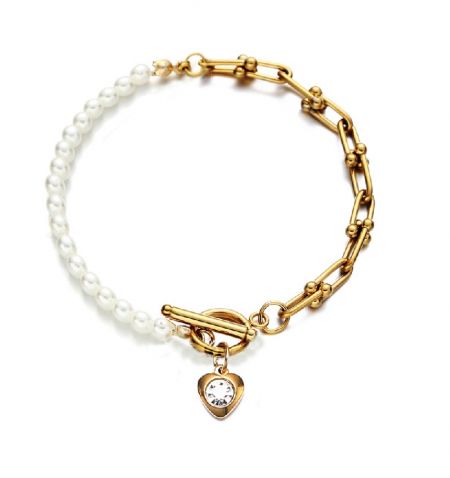 Kristallen hart parel schakelarmband - Crystal Heart Pearl Toggle Bracelet in verguld roestvrij staal, met witte parels en een kristallen hartbedel.