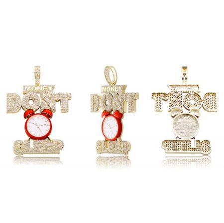 A collection of three gold pendants with unique clock and text designs.