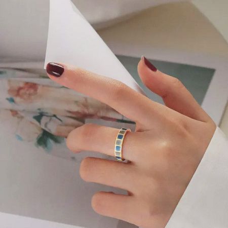 Gold Plated Blue and White Enamel Geometric Design Open Finger Rings - A close-up of a gold-plated open finger ring from the set, featuring a geometric design with blue and white enamel stones.