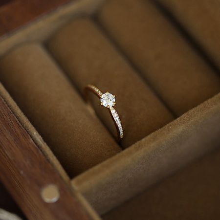 Another view of the solitaire ring inside its presentation box, emphasizing its premium quality.