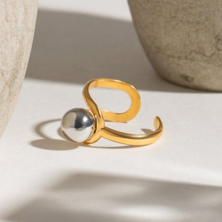 Minimalist 18K gold plated stainless steel open ring with a silver ball accent.