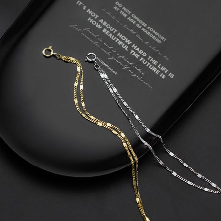Photo produit des bracelets en chaîne en or et en argent.