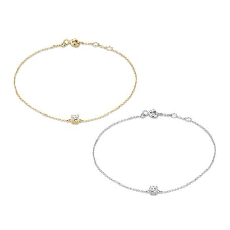 Dunne kettingarmband van 925 sterling zilver met enkele cubic zirconia - Een set van dunne kettingarmbanden van 925 sterling zilver, één met een gouden afwerking en één met een zilveren afwerking, elk met een enkele sprankelende cubic zirconia steen.