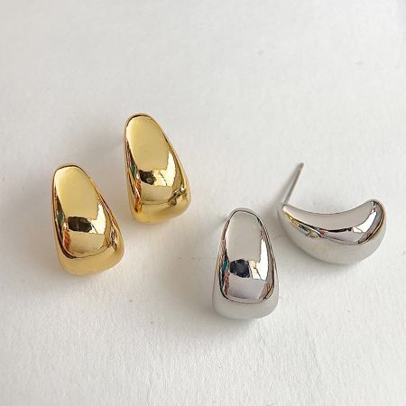 Chunky Waterdrop Shape Stud Earrings - A product shot of chunky waterdrop stud earrings, displaying both the gold and silver plated options on a clean white background.