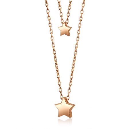 Detailed shot of the Twin Star Necklace's spring clasp and polished finish.