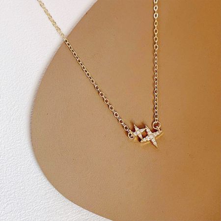 Gold Plated Zirconia Double Star Collar Necklaces - A stunning gold-plated collar necklace featuring a sparkling double-star charm with micro-insert zirconia, displayed on a clean white background.