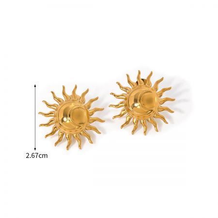A pair of elegant gold sun-shaped earrings with a smooth finish.