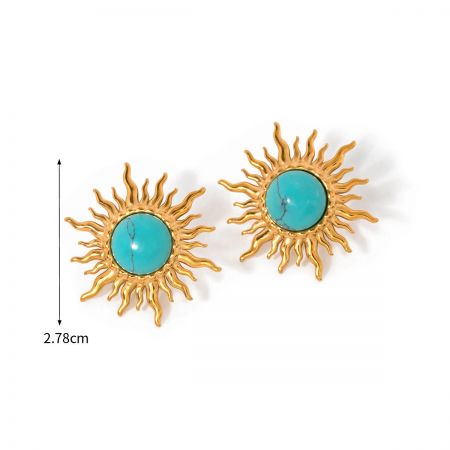 Close-up of a pair of gold sun earrings with a central turquoise stone, showing size dimension.