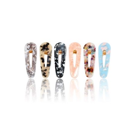 Tortoise Shell Hair Barrette Clip - A collection of six Tortoise Shell Hair Barrette Clips in various colors and patterns, showcasing the unique designs made from cellulose acetate.
