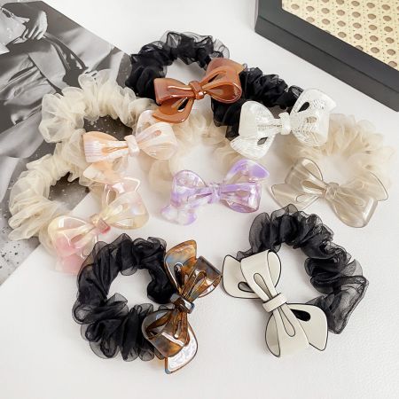 Acetic Acid Acetate Bow Shape Charms Hair Tie Scrunchies (Set of 5) - A colorful collection of acetate bow-shaped hair tie scrunchies, showcasing various styles and designs available for sale.