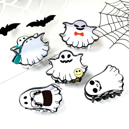 An assortment of Halloween ghost hair clips arranged neatly, highlighting the different playful designs available for bulk order.
