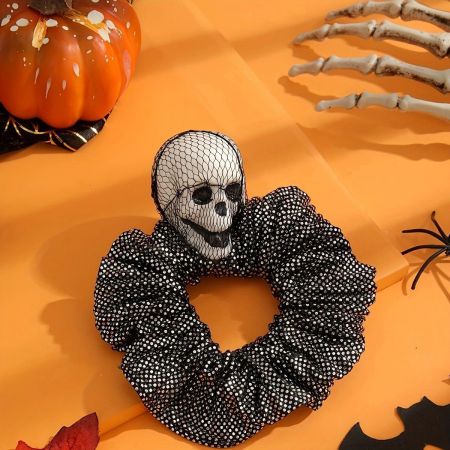 Another angle of the vintage punk skull scrunchie, showcasing the fabric texture.