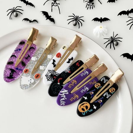 No Crease Acrylic Halloween Hair Clips with Pumpkin, Bat, and Moon Prints - A collection of five no-crease acrylic hair clips with various Halloween designs including pumpkins, ghosts, and spooky phrases.